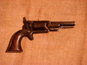 Revolver Colt-Root Pocket 1855, velkou oblibu si nezískal a za výrobu v počtu několika desetitisíců vděčí jen velké poptávce po zbraních za americké občanské války.
