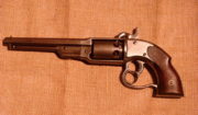 Revolver Savage-North Navy (1860), 2. model, vyrobený od roku 1861 do poloviny 60. let v počtu kolem 20 000 kusů.